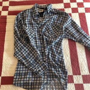 Flannel top. Blue plaid pattern.
